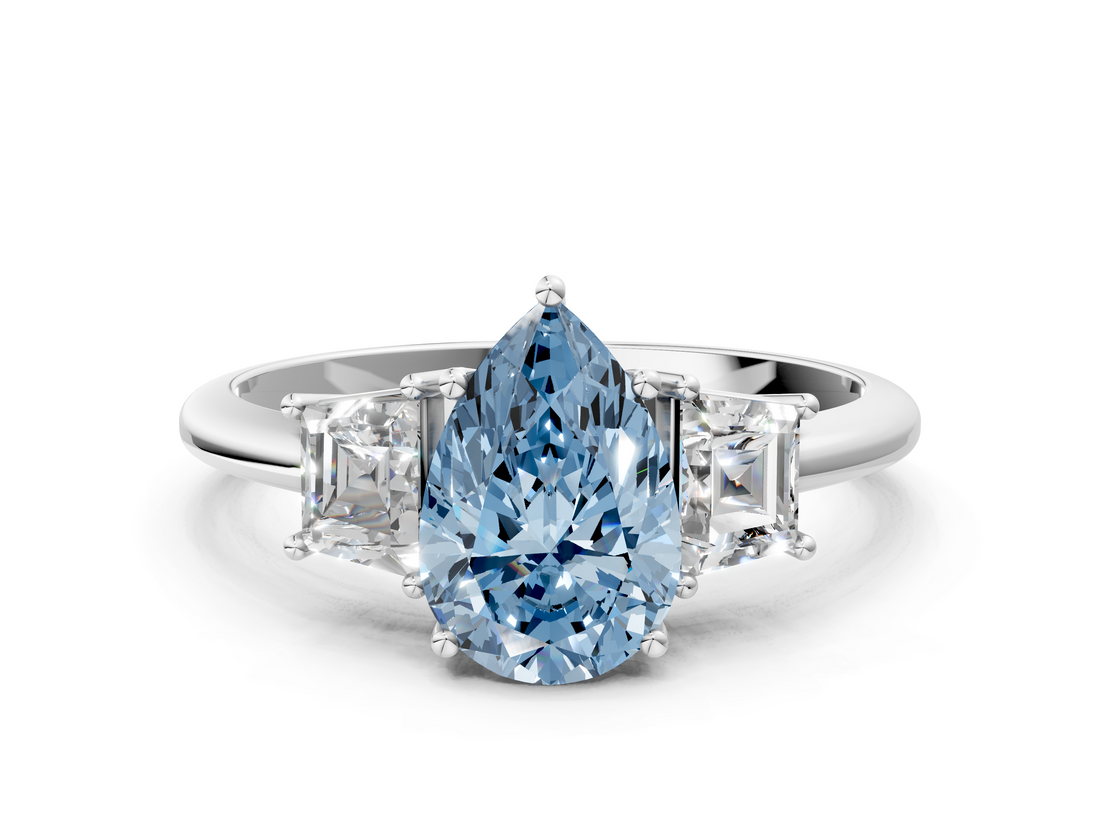 White gold Fancy Blue Pear  Diamond Three-Stone Ring with Trapezoid Side Stones and Prong Setting_17