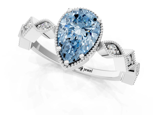 White gold Fancy Blue Pear  Milgrain Marquise Diamond Twist Band Ring