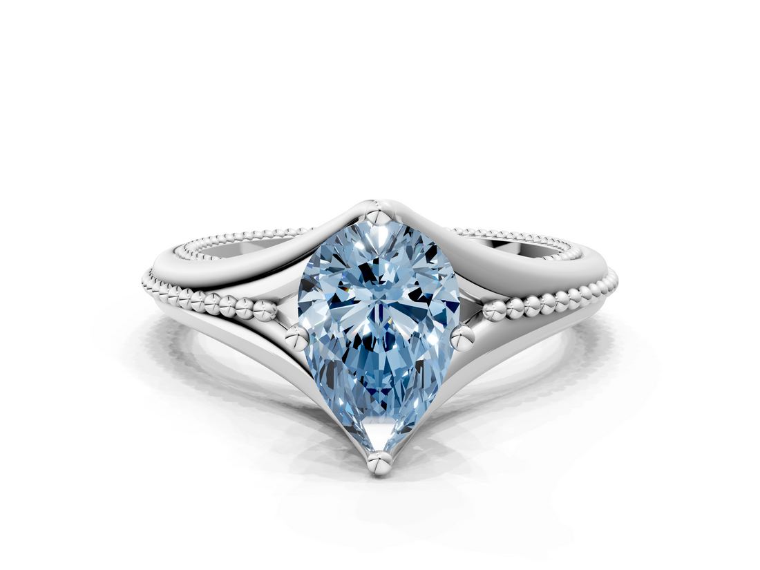 White gold Fancy Blue Pear  Solitaire Beaded Band Six-Prong Setting