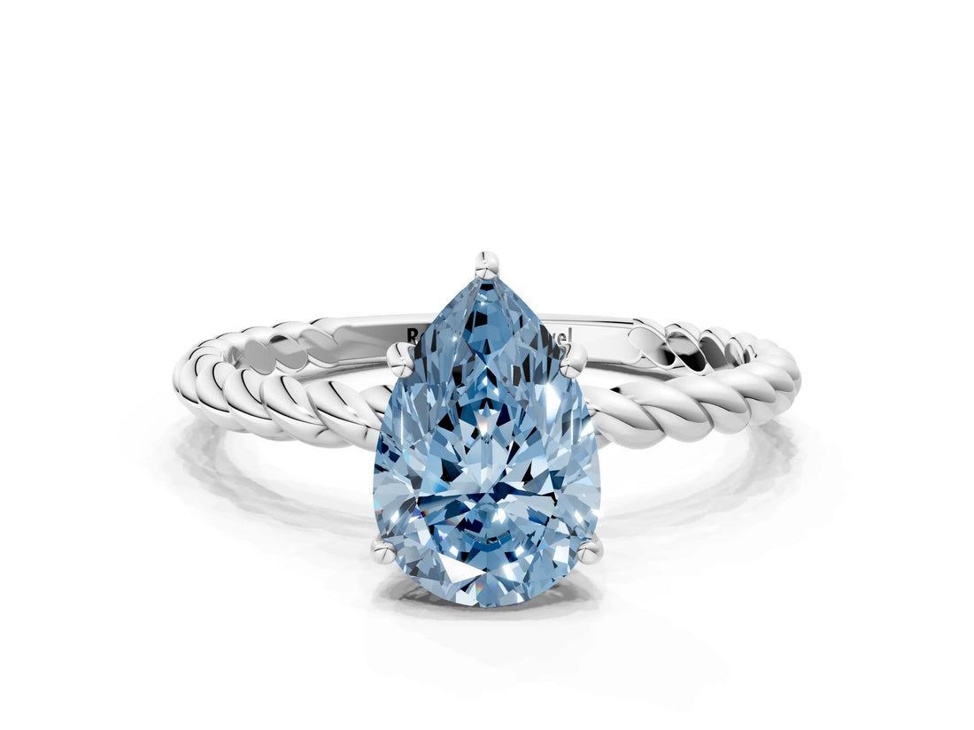 White gold Fancy Blue Pear  Solitaire Twist Band Ring with Four-Prong Setting_141