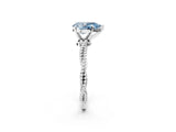 White gold Fancy Blue Pear  Solitaire Twisted Band with Bead Prong Setting_380