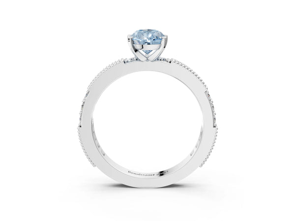White gold Fancy Blue Pear  Solitaire with Pavé Band and Four-Prong Setting