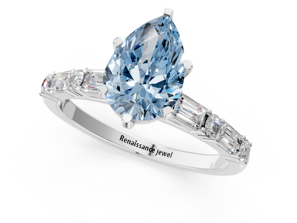 White gold Fancy Blue Pear Cut Diamond Solitaire with Side Baguettes and Channel Set Band