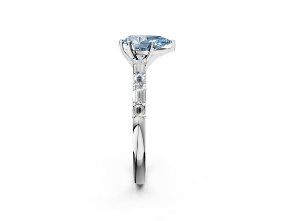 White gold Fancy Blue Pear Cut Diamond Solitaire with Side Baguettes and Channel Set Band