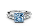 White gold Fancy Blue Princess  Brilliant Solitaire with Side Stones on a Pave Band and Four-Prong Setting_60