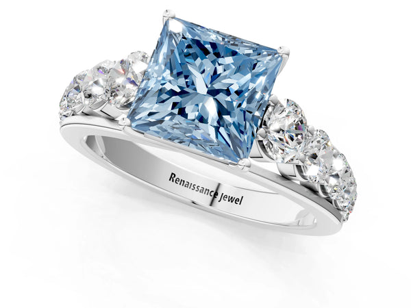 White gold Fancy Blue Princess Cut Brilliant Diamond Pavé Band with Six-Prong Setting