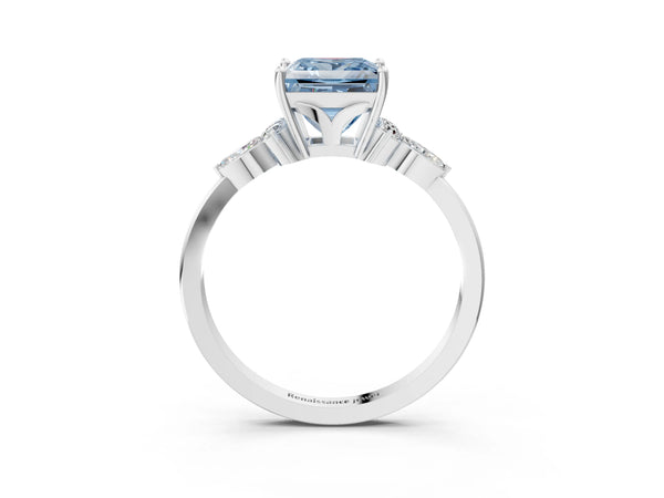 White gold Fancy Blue Princess Cut Brilliant Diamond Solitaire Ring with Pear Side Stones and Four-Prong Setting