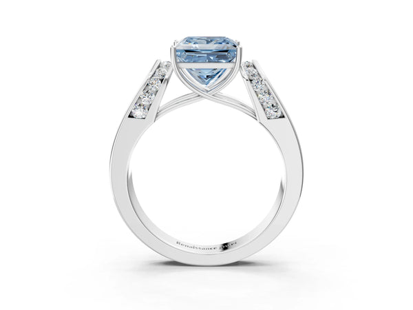 White gold Fancy Blue Princess Cut Cut Diamond Channel Set Solitaire Ring with Four-Prong Setting