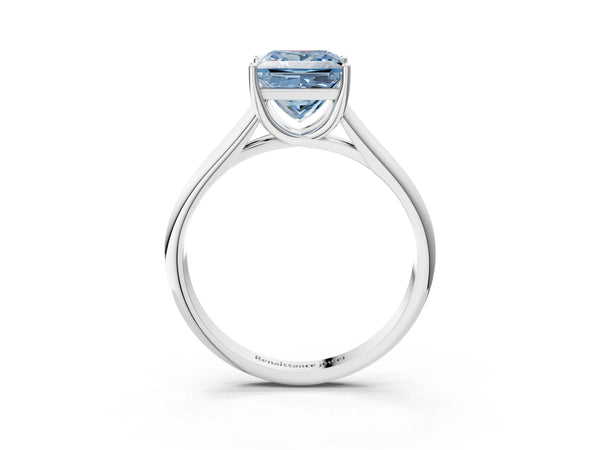 White gold Fancy Blue Princess Cut Cut Diamond Solitaire Engagement Ring with Tapered Plain Band and Four-Prong Setting