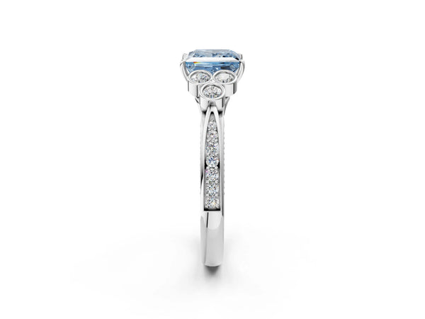 Platinum Fancy Blue Princess  Cut Diamond Engagement Ring with Bezel Set Round Side Stones and Prong Setting