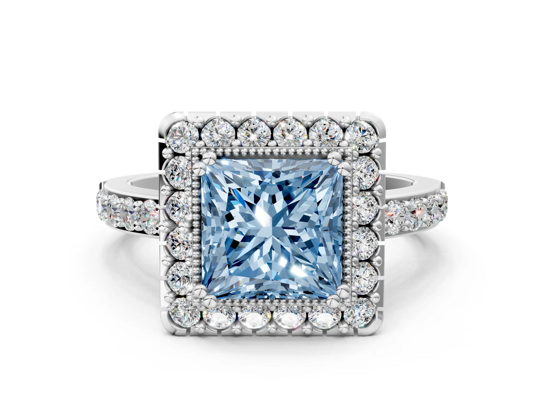 White gold Fancy Blue Princess Cut Diamond Halo Ring with Pavé Band and Prong Setting