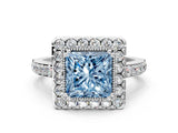 White gold Fancy Blue Princess Cut Diamond Halo Ring with Pavé Band and Prong Setting