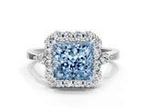 White gold Fancy Blue Princess Cut Diamond Halo Ring with Pear Side Stones and Prong Setting_75