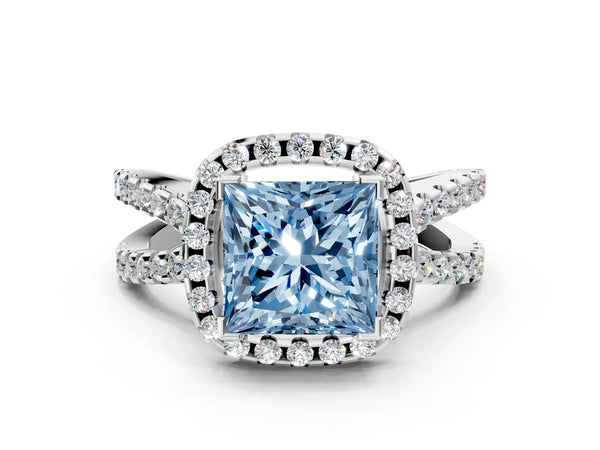 White gold Fancy Blue Princess Cut Diamond Halo Ring with Split Shank Pavé Band and Prong Setting