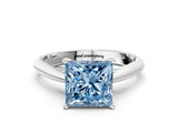 White gold Fancy Blue Princess Cut Diamond Solitaire Engagement Ring with Cathedral Setting and Four-Prong Mount