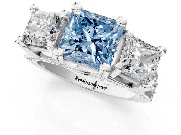 White gold Fancy Blue Princess Cut Diamond Three-Stone Ring with Channel Set Band and Four-Prong Setting