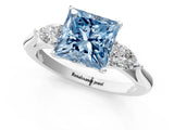 White gold Fancy Blue Princess Cut Diamond Three-Stone Ring with Pear  Side Stones and Prong Setting_127