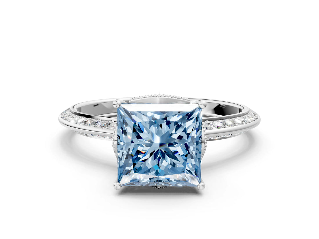 White gold Fancy Blue Princess Cut Solitaire Split Shank Pave Diamond Engagement Ring with Four-Prong Setting