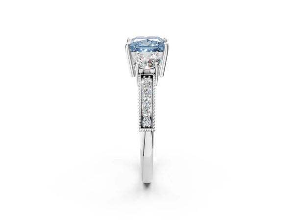 White gold Fancy Blue Princess Cut Three-Stone Diamond Ring with Pavé Band and Four-Prong Setting