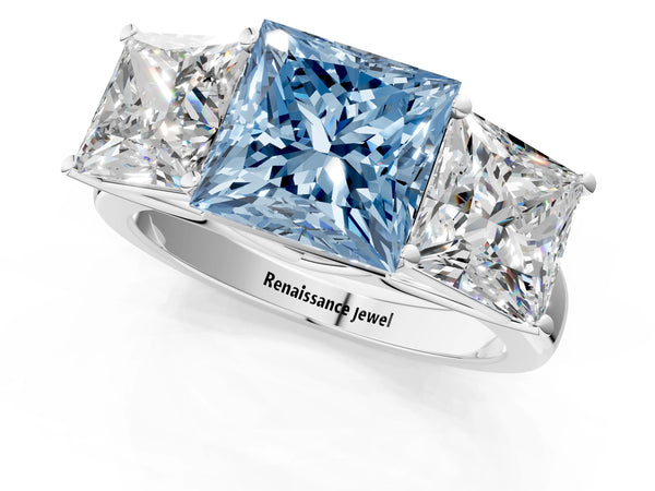 Platinum Fancy Blue Princess Cut Three-Stone Diamond Ring with Prong Setting on a Classic Band