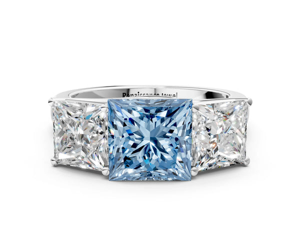 Platinum Fancy Blue Princess Cut Three-Stone Diamond Ring with Prong Setting on a Classic Band