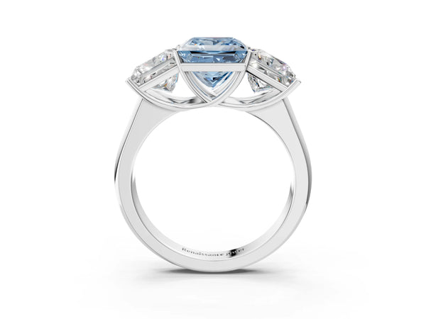 Platinum Fancy Blue Princess Cut Three-Stone Diamond Ring with Prong Setting on a Classic Band