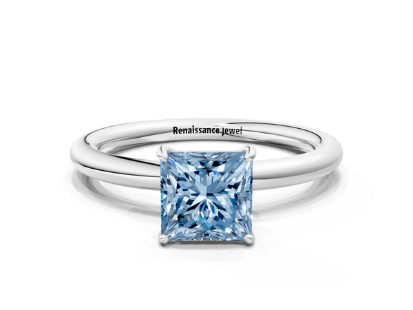 Platinum Fancy Blue Princess  Solitaire Diamond Ring with Four-Prong Setting on a Plain Band