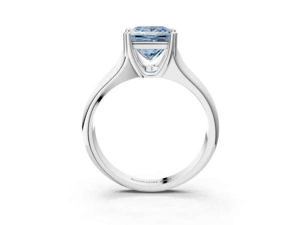 White gold Fancy Blue Princess Cut Diamond Solitaire Ring with Wide Band and Prong Setting