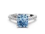 White gold Fancy Blue Radiant  Brilliant Diamond Solitaire with Pavé Band and Four-Prong Setting