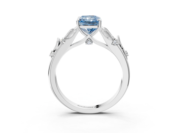 White gold Fancy Blue Radiant Cut Diamond Solitaire Ring with Leaf Motif Band and Four-Prong Setting