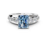 White gold Fancy Blue Radiant  Brilliant Solitaire with Side Stones on a Pave Band and Four-Prong Setting_24