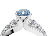 White gold Fancy Blue Radiant  Brilliant Solitaire with Side Stones on a Pave Band and Four-Prong Setting_65