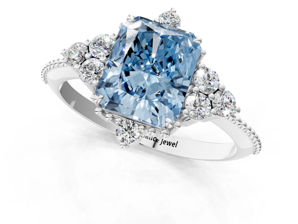 Platinum Fancy Blue Radiant Cut Brilliant Diamond with Cluster Setting on a Beaded Band and Four-Prong Setting