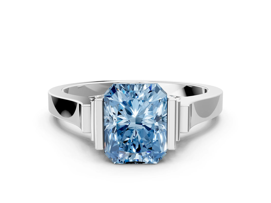 White gold Fancy Blue Radiant Cut Brilliant Solitaire Diamond Ring with Channel Set Band and Bar Prong Setting