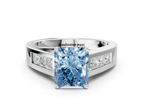 White gold Fancy Blue Radiant Cut Cut Channel Set Solitaire Ring with Four-Prong Setting
