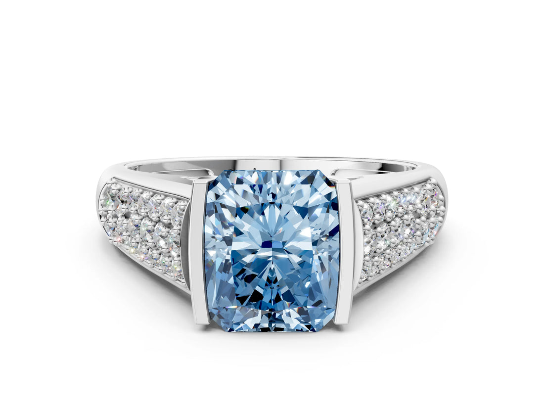 White gold Fancy Blue Radiant Cut Cut Diamond Channel Set Pave Band with Tension Prong Setting