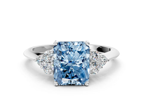 White gold Fancy Blue Radiant Cut Cut Diamond Cluster Ring with Solitaire Band and Four-Prong Setting