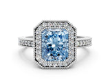 White gold Fancy Blue Radiant Cut-Cut Diamond Halo Engagement Ring with Pave Band and Prong Setting