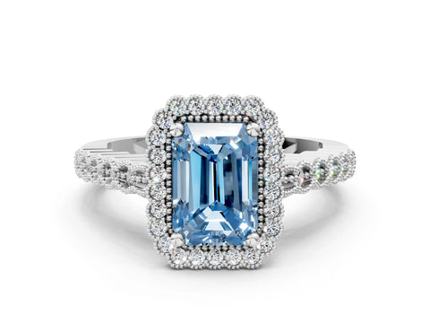 White gold Fancy Blue Radiant Cut Cut Halo Pavé Solitaire Ring with Milgrain Band