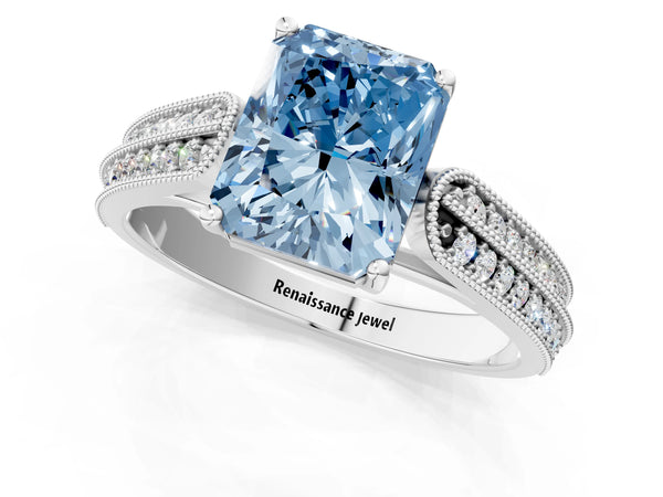Platinum Fancy Blue Radiant Cut Cut Pave Split Shank Engagement Ring with Four-Prong Setting