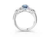 White gold Fancy Blue Radiant  Cut Diamond Cluster Ring with Round Accent Stones and Prong Setting on a Classic Band_70