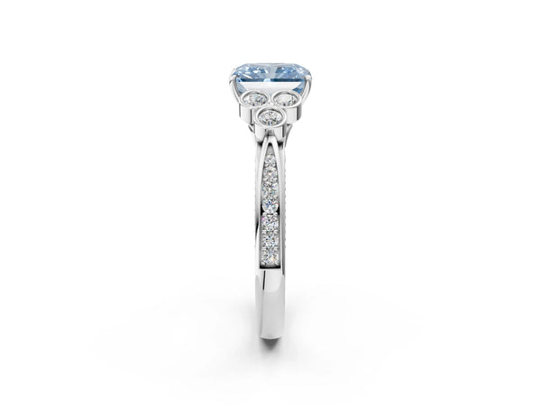 Platinum Fancy Blue Radiant  Cut Diamond Engagement Ring with Bezel Set Round Side Stones and Prong Setting