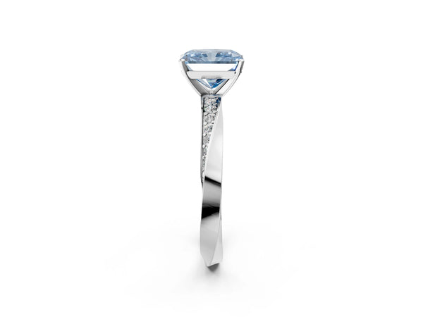 White gold Fancy Blue Radiant Cut Diamond Engagement Ring with Side Stone Accents and Four-Prong Setting