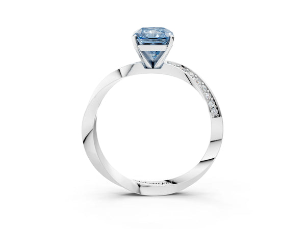 White gold Fancy Blue Radiant Cut Diamond Engagement Ring with Side Stone Accents and Four-Prong Setting