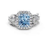 White gold Fancy Blue Radiant Cut Diamond Halo Ring with Milgrain Pavé Band and Four-Prong Setting_66