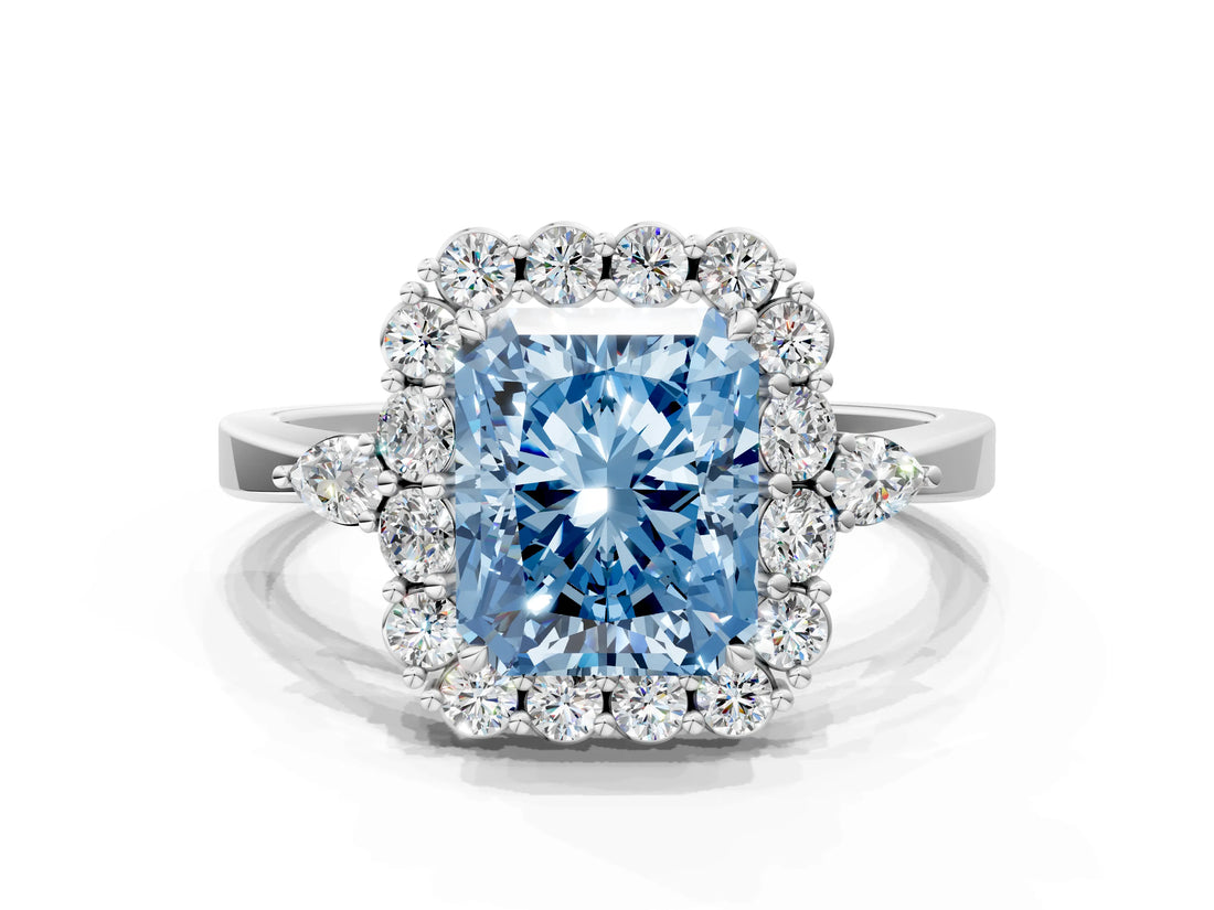White gold Fancy Blue Radiant Cut Diamond Halo Ring with Pear Side Stones and Prong Setting_104