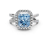 White gold Fancy Blue Radiant Cut Diamond Halo Ring with Split Shank Pavé Band and Prong Setting_79