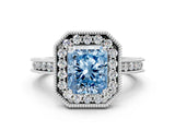 White gold Fancy Blue Radiant Cut Diamond Milgrain Halo Engagement Ring with Round Pavé Band and Prong Setting_12