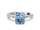 White gold Fancy Blue Radiant Cut Diamond Ring with Marquise and Round  Side Stones and Four-Prong Setting_52