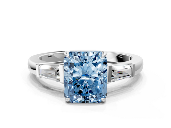 White gold Fancy Blue Radiant  Cut Diamond Ring with Tapered Baguette Side Stones in Four-Prong Setting